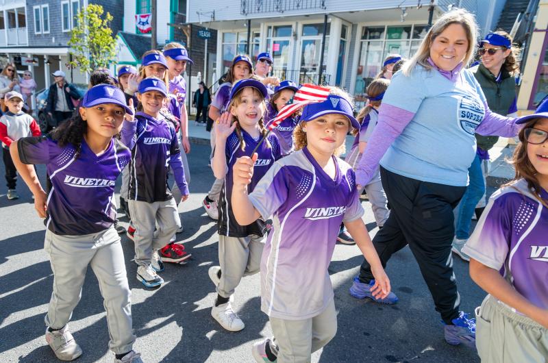 The Vineyard Softball team leads the parade.