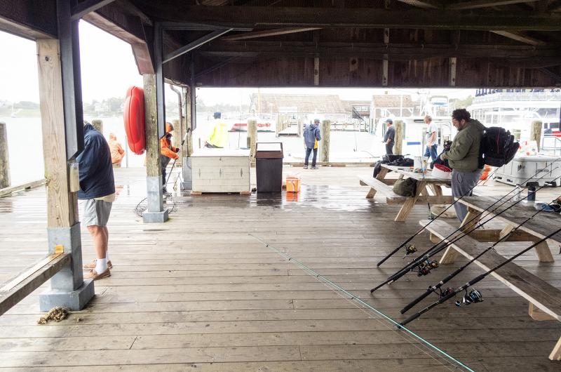 There is always a morning fishing scene at Memorial Wharf in Edgartown.