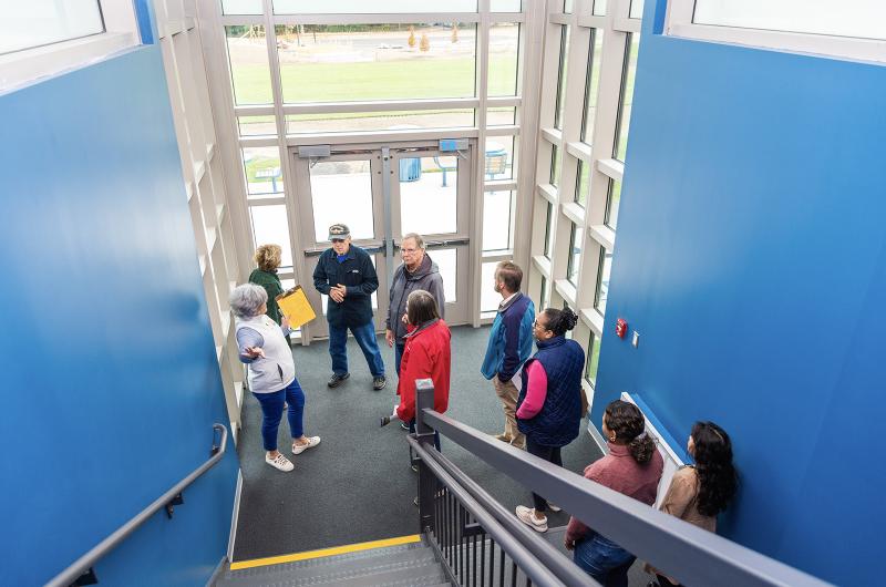 Fourth grade teacher Meredith Goldthwait leads a tour group.