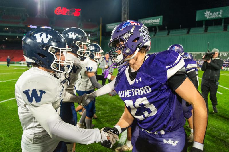 Captains shake hands at the start.