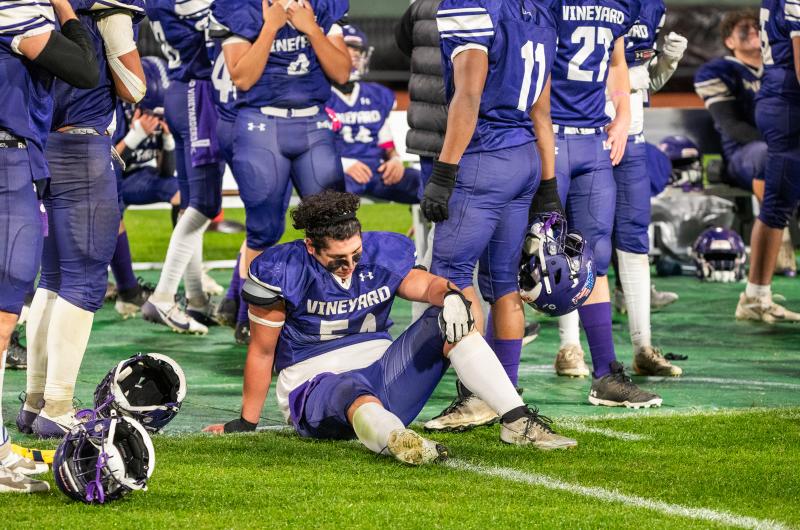 Xander Laiacona is dejected after the loss.