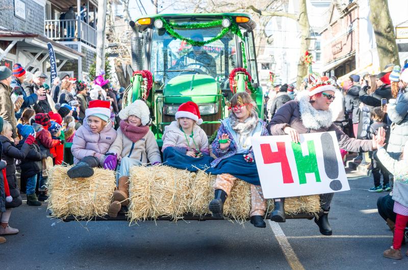The 4H club rests their feet mid-parade.