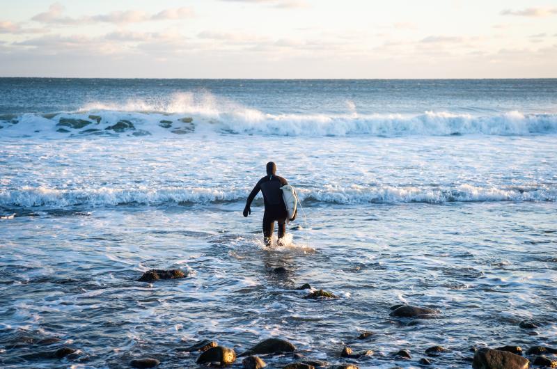 Paddling out.