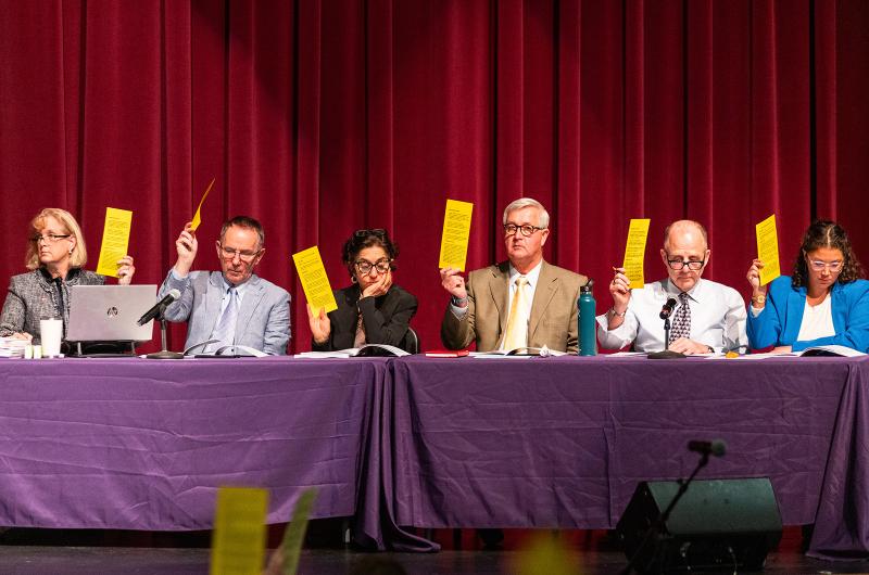 Oak BLuffs select board members cast their votes.