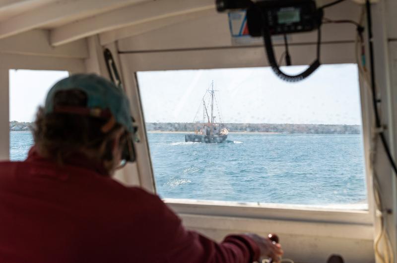 Little Lady seen through the window of Nat Benjamin's work boat Patrol.