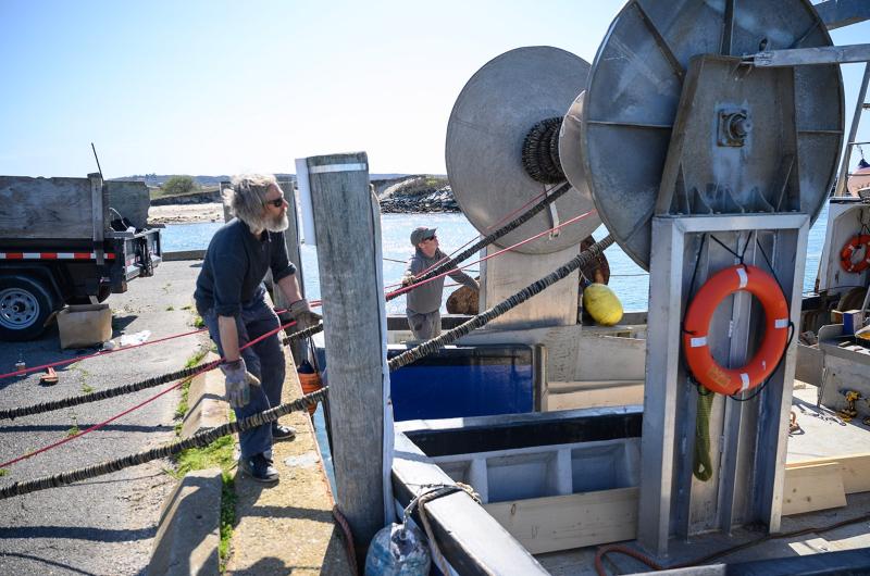 Loading the gear onto the net reel.