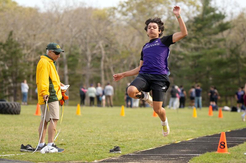Giving it his all at the long jump.