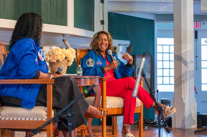 Joan Higginbotham, right, talks about her career as an astronaut.