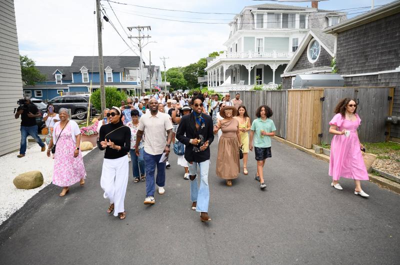 Union Chapel congregation members make their way down to Inkwell beach in Oak Bluffs.