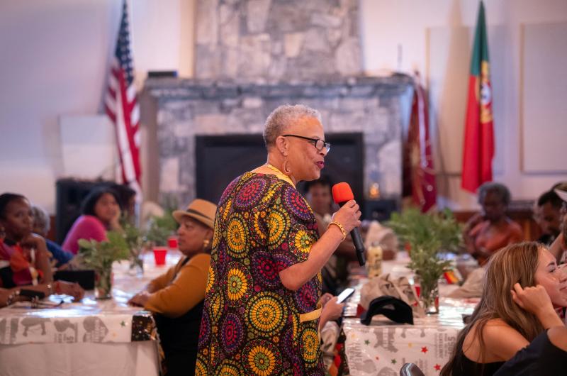 Toni Kauffman speaks to the crowd at Taste of Juneteenth held at the PA Club.