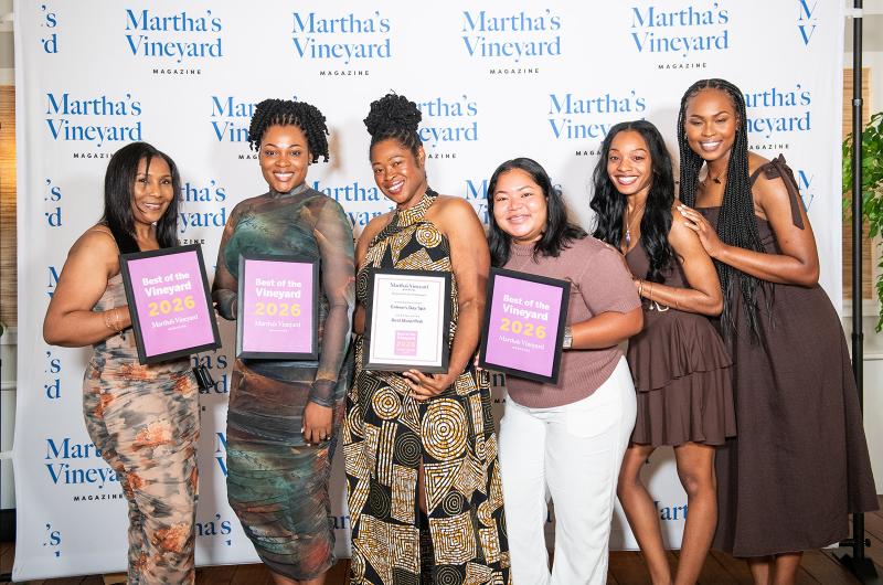 Caleen's Day Spa poses with their award.