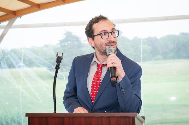 Comedian Charlie Nadler warms up the crowd.