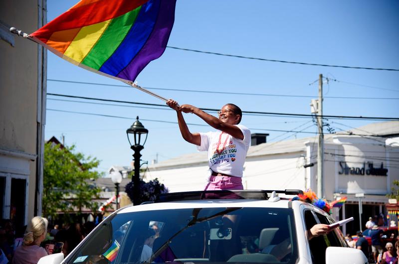 Holding the Pride flag high.