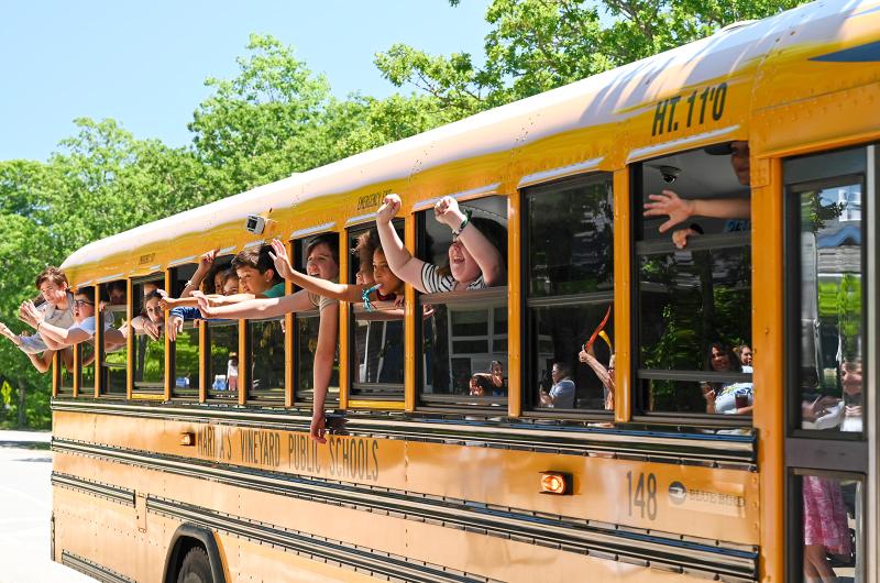 West Tisbury students wave goodbye.