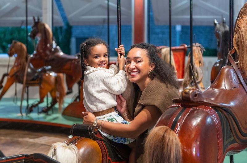 Leilani and Denine Ngoyi enjoy the ride together.
