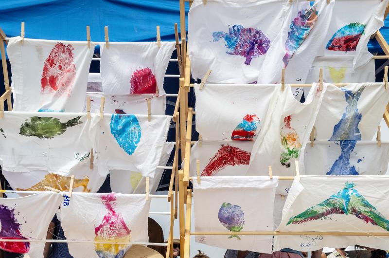 Fish print art adds color to the dock.