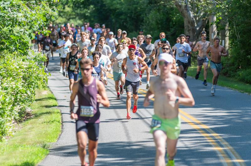 The pack makes its way down Middle Road.