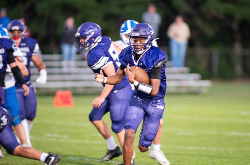 Adam Parchment with a quarterback keeper.