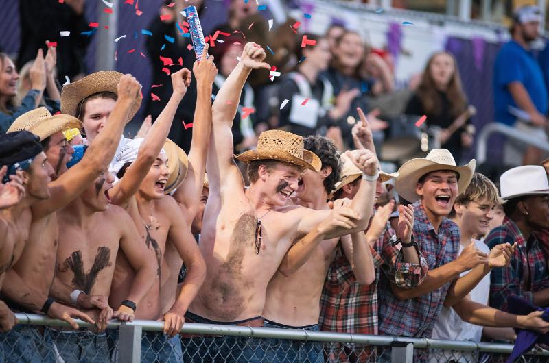 The crowd celebrates the big play on western night.