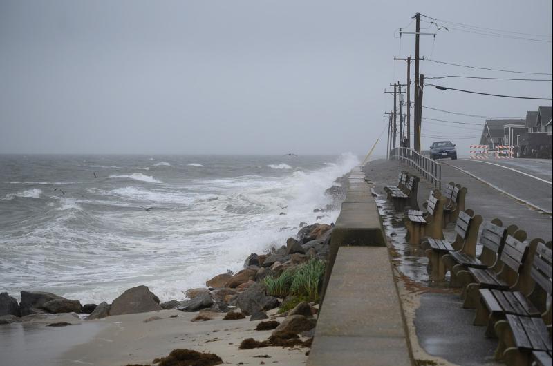 Waves beat against the Oak Bluffs sea wall.